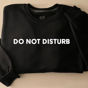 do not disturb crewneck sweater