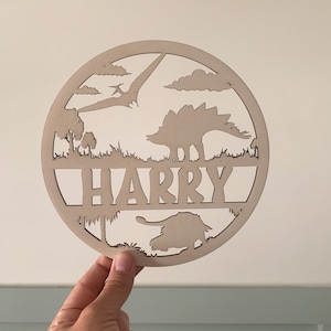 Dinosaur name sign, dinosaur wooden plaque, dinosaur bedroom sign, Round name sign, personalised wooden wall, door hanging