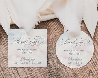 May include: Two baby shower favor tags with the text "Thank you" in elegant script. One tag is square, the other is round. Both feature a watercolor sky design and the text "For celebrating with us!" and "Penelope's Baby Shower".
