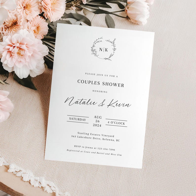 May include: A white wedding shower invitation with a floral wreath and the initials "N/K" in the center. The text reads "Please join us for a Couples Shower honoring Natalie & Kevin Saturday, Aug 26, 2024, 4 o'clock Starling Estates Vineyard, 363 Lakeshore Drive, Kelowna, BC RSVP to Jenna at 123-456-7890 Registered at Crate and Barrel and West Elm"
