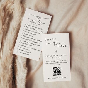 May include: Two white cards with black text. The first card has a checklist titled "I Spy Wedding Photo Challenge" with a list of items to find in wedding photos. The second card has the text "Share the Love" and a QR code with the text "Share your photos with us! Scan the QR code with your smartphone and upload your photos! #AveryLovesJacob".