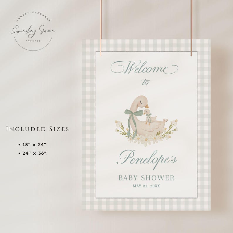 May include: A welcome sign for a baby shower with a light blue and white gingham background. The sign features a watercolor illustration of a mother goose and her gosling with a floral wreath. The text reads "Welcome to Penelope's Baby Shower May 21, 20XX".