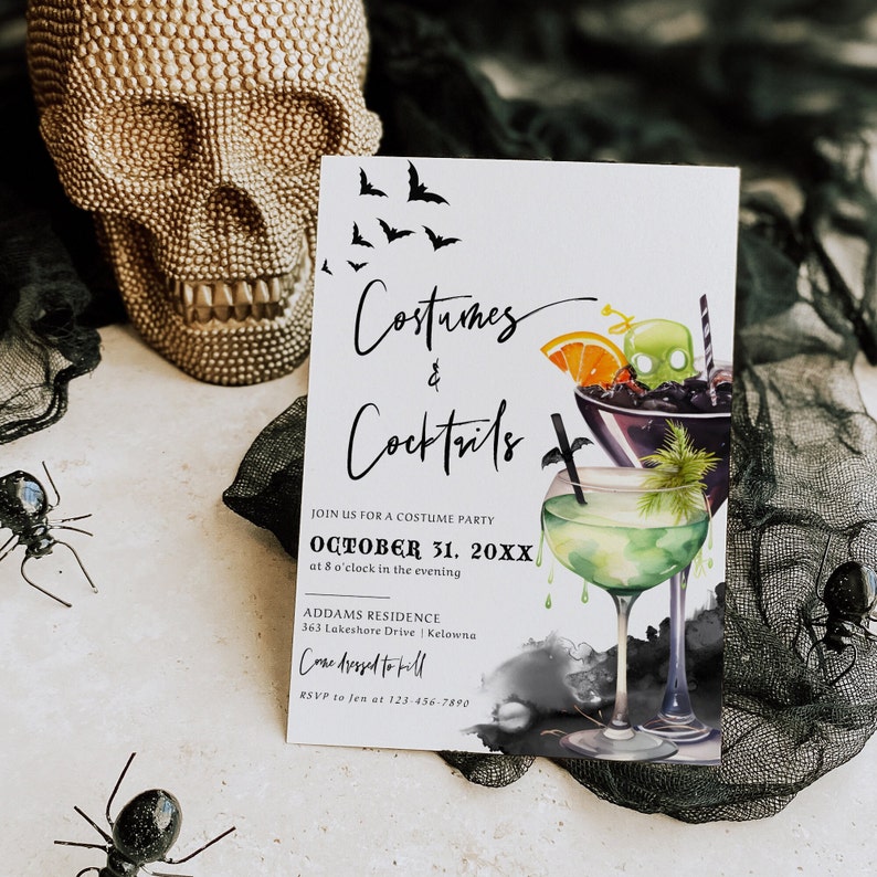 May include: A white invitation card with black text and illustrations. The text reads "Costumes & Cocktails" and "Join us for a costume party October 31, 20XX at 8 o'clock in the evening Addams Residence 363 Lakeshore Drive | Kelowna Come dressed to kill RSVP to Jen at 123-456-7890". The illustrations are of two cocktails, one green and one purple, with bats flying in the background.