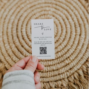 May include: White card with black text that reads "SHARE the LOVE" and "SHARE YOUR PHOTOS WITH US!"  Scan the QR code with your smartphone and upload your photos!"  The card also includes the text "AVERYLOVESJACOB".