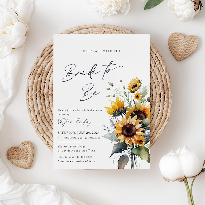 May include: A bridal shower invitation with the text "Bride to Be" and floral accents. The invitation features sunflowers and greenery, with event details including the date, time, and location. The invitation is on a white background.