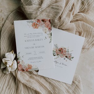 May include: Wedding invitation featuring a floral design. The invitation is for Kaitlyn Bailey and Trevor Martin, and the wedding will take place on 10 October 20XX at 4 o'clock at Starling Estates Vineyard in Kelowna, BC.
