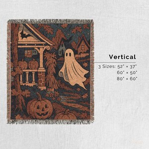 May include: A Halloween-themed throw blanket featuring a haunted house, pumpkins, and a ghost. Available in three sizes: 132cm x 94cm, 152cm x 127cm, and 203cm x 152cm. The design uses brown, orange, and blue tones.