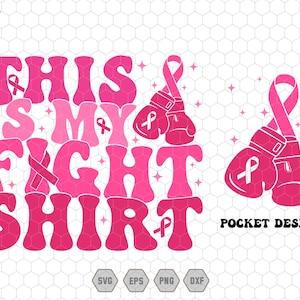 May include: A pink graphic design with the text "THIS IS MY FIGHT SHIRT" in a retro font. The design includes pink boxing gloves with pink ribbons, and the words "POCKET DESIGN".