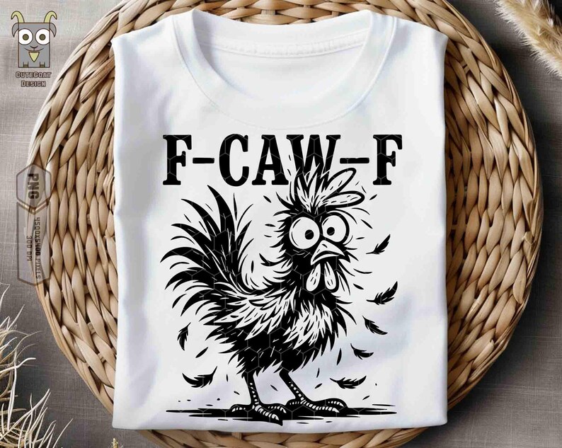 May include: White t-shirt with a black and white cartoon rooster graphic. The rooster has large eyes and feathers falling around it. The text "F-CAW-F" is printed above the rooster.