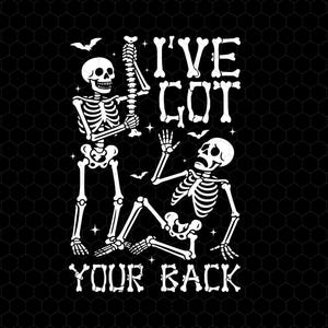 May include: A black graphic design features two white skeletons with the text "I'VE GOT YOUR BACK". One skeleton stands holding a spine, while the other sits with a raised hand. Bats and stars are also included.
