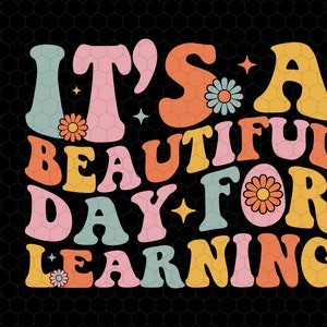 May include: A colorful retro-style graphic with the text "It's a beautiful day for learning". The text is in a variety of colors, including pink, yellow, orange, and blue. There are also small flower designs throughout the graphic.