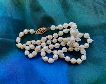 Cultured Round Slightly Baroque Creamy White Knotted Pearls 18" (5-5.5mm)