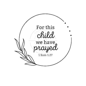 Può includere: Illustrazione in bianco e nero di una ghirlanda con foglie e un cerchio contenente il testo "For this child we have prayed 1 Sam 1:27".