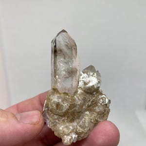 Tabular Smoky Quartz On Matrix With An Enhydro From Goboboseb, Namibia