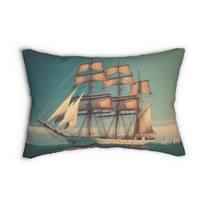 May include: A decorative pillow featuring a vintage-style image of a tall sailing ship with white sails against a blue sky and ocean.