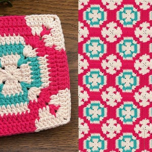 May include: A square, handmade crochet piece in a granny square pattern. The design features a central turquoise and white floral motif, surrounded by a pink border. The pattern is repeated on the right side of the image.