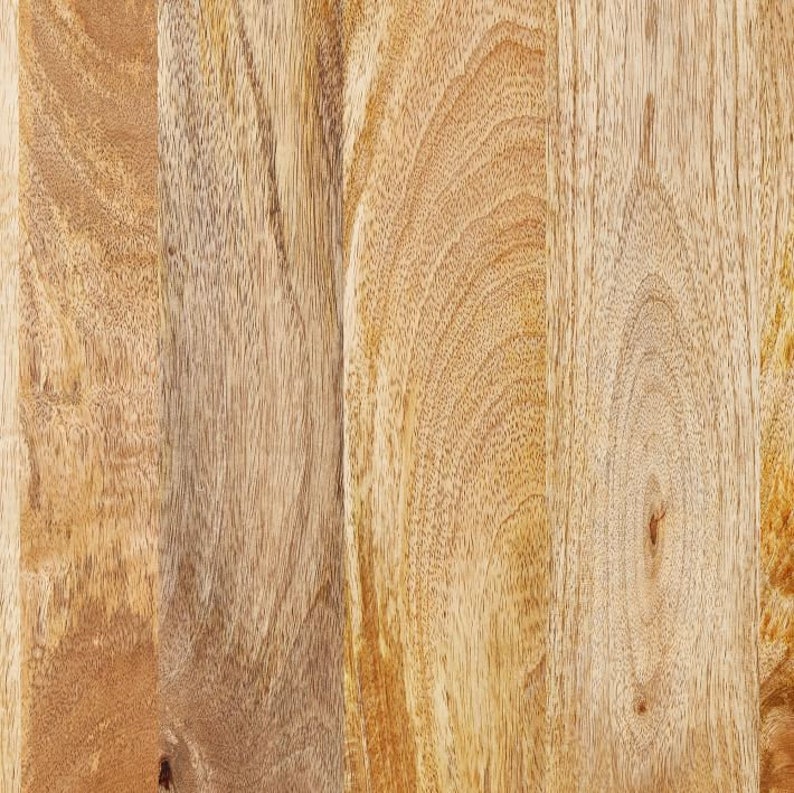 May include: Close-up of a light brown wood surface with a natural grain pattern. The wood has a warm, golden hue and a smooth texture.