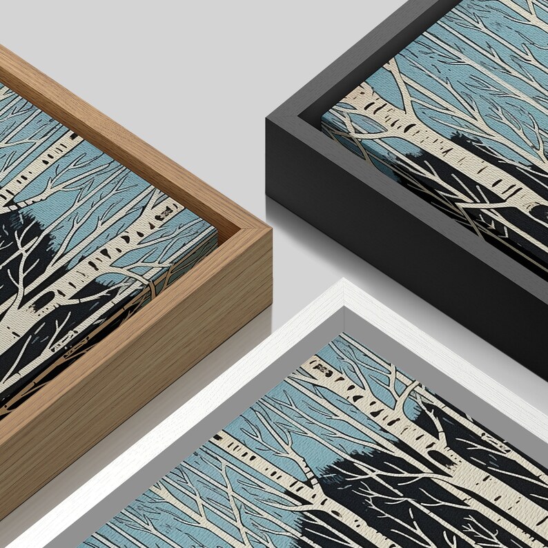 May include: A canvas print of a forest scene with white birch trees against a blue sky. The print is framed in a natural wood frame.