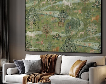 May include: A large framed tapestry depicting a lush green landscape with trees, a river, and various animals, including lions, deer, and unicorns. The artwork hangs above a white sofa with decorative pillows and a brown throw blanket. A round marble coffee table is in front of the sofa.