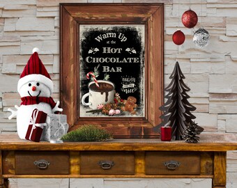 May include: A rustic wooden sign with a chalkboard background advertising a hot chocolate bar. The sign features a cup of hot chocolate with whipped cream and a candy cane, a gingerbread man, and the text "Warm Up at the Hot Chocolate Bar".