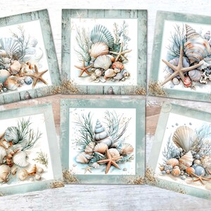 May include: Six framed watercolour prints showcasing seashells, starfish, and aquatic plants. The artwork uses soft blues, creams, and sandy tones, creating a coastal theme. Each square print is framed in a light blue, distressed-wood style, evoking a seaside aesthetic.