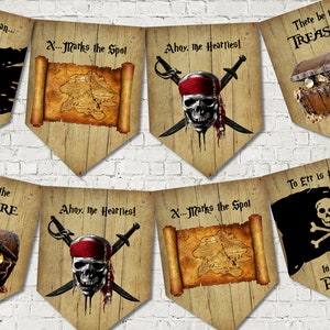 May include: A set of ten pirate-themed pennants for a party or event. The pennants are made of wood and feature various pirate-themed images and text, including a skull and crossbones, a treasure chest, a map, and the phrase "Ahoy, the Heartles!"