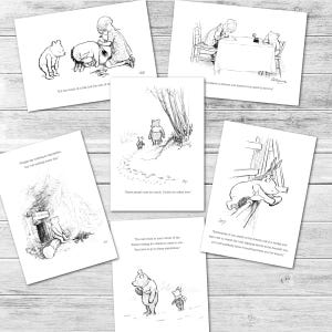May include: Six monochrome art prints featuring illustrations of Winnie the Pooh and friends. Each print includes a quote from the stories. The prints are arranged on a light wood-grain surface.
