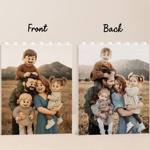 May include: Two white Lego-style blocks with family photos. The front block shows a family of five, with the text "Front" above. The back block shows the same family, with the text "Back" above. The photos are set against a backdrop of a field and mountains.