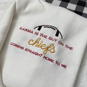 Karma Is The Guy On The Chiefs Embroidered Sweatshirt