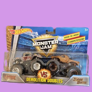 Hot Wheels Monster Jam Zombie vs. Zombie Hunter 1:64 Scale Die-Cast 2-Pack ITEM #2139 image 1