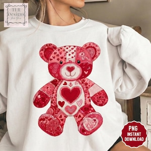 May include: White sweatshirt with a patchwork teddy bear design in red and pink hues. The bear has heart-shaped details and a heart on its chest. The design is a PNG instant download.