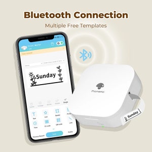 May include: A white Phomemo label printer with a blue Bluetooth icon and a smartphone displaying a label design with the text "Sunday" in a black font. The label design includes a sun, leaves, and a border. The smartphone screen shows a variety of label design options, including text, icons, borders, QR codes, and lines.