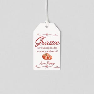 May include: White gift tag with the word "Grazie" in red script, along with the text "For making my day so saucy and sweet!" and "Love, Poppy." Features a watercolor illustration of two tomatoes.