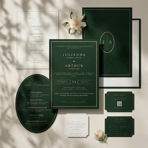 May include: Elegant wedding invitation suite in shades of green and gold. Includes invitation cards, RSVP cards, and details cards. Features floral accents and classic typography. The suite includes the names Julianna and Arthur Sterling.