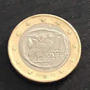 Moneda 1 euro 2002 búho letra S grabada en la estrella error centrado de la O euro