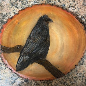 Hand burned raven wall art
