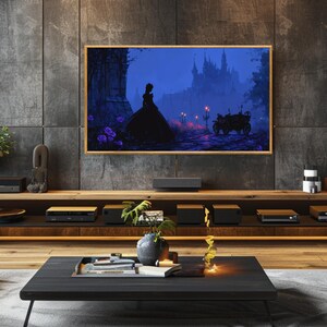 May include: A framed digital art print depicting a silhouette of a person in a long gown, standing before a castle. The artwork is set against a dark blue backdrop with purple accents, and a carriage is visible in the distance. The frame is a light wood color.