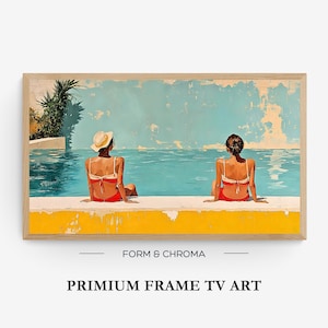 May include: A framed print of two figures in red swimwear sitting by a pool, with a light blue sky and water background. The artwork is labeled "FORM & CHROMA" and "PRIMIUM FRAME TV ART". The frame is a light wood color.