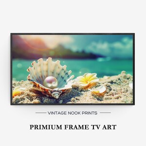 May include: A framed print featuring a seashell with a pearl resting on sand, with a tropical beach scene in the background. The print includes the text "VINTAGE NOOK PRINTS" and "PRIMIUM FRAME TV ART". The color palette includes beige, white, and turquoise.