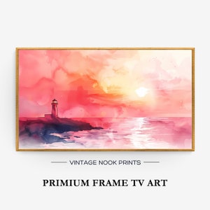 May include: A watercolor painting of a lighthouse on a rocky shore with a pink and orange sunset over the ocean. The painting is framed in a gold frame.