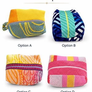May include: Four fabric pouches labeled Pouch Options. Option A is yellow and blue with a side loop. Option B features a blue, white, and green geometric pattern with a yellow zipper. Option C is orange, pink, and purple. Option D is pink and yellow.