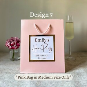 Luxury Personalised Team Bride Gift Bag and white sticker with gold foil writing and sticker. Writing says team bride with the option for adding a name and a date or location. Perfect for hen party favours and hen party gifts for your Team Bride.