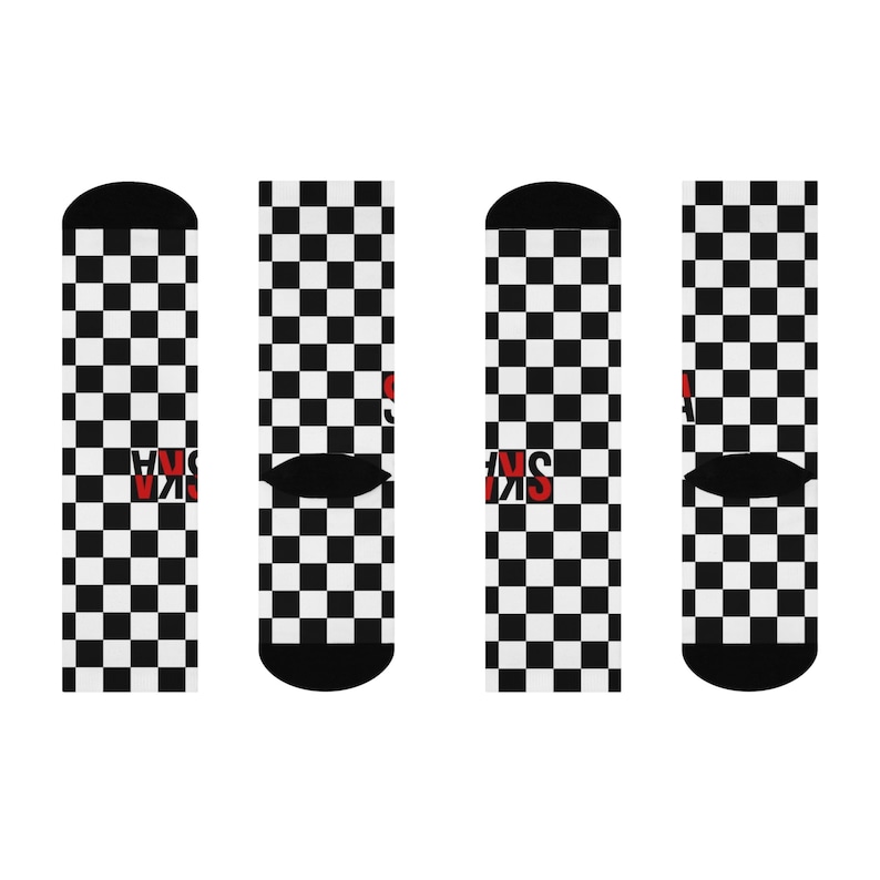 May include: A pair of black and white checkered socks with the word "SK8" in red letters on the side.