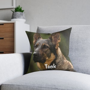 May include: A throw pillow with a close-up image of a German Shepherd dog with brown and black fur. The dog is looking to the right of the image. The text "Tank" is printed on the pillow below the dog's head.