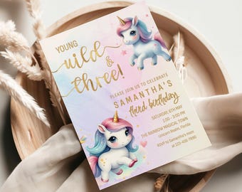 May include: A birthday invitation with a unicorn theme. The invitation features two cartoon unicorns, gold text that reads "Young, Wild & Three!" and details for Samantha's third birthday party.