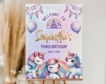 May include: Welcome to Samantha's Third Birthday sign with a purple, blue, and pink background. The sign features a rainbow, a castle, and three unicorns. The text is in gold glitter.
