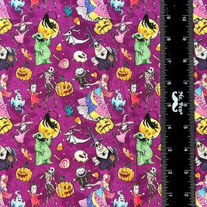 May include: Purple fabric with a repeating pattern of characters from the Nightmare Before Christmas and The Grinch. The characters include Jack Skellington, Sally, Zero, and the Grinch. There are also pumpkins, candy corn, and other Halloween-themed imagery.