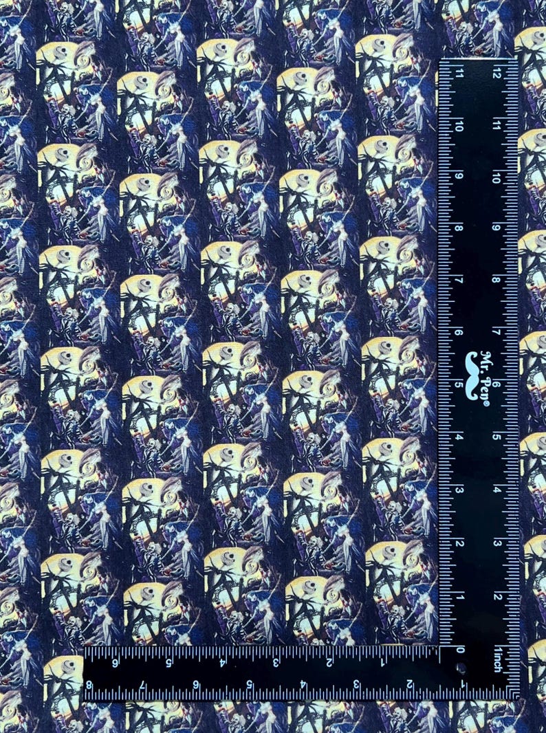 May include: A repeating pattern fabric featuring a colorful illustration of Jack Skellington from the Nightmare Before Christmas movie. The fabric is dark blue with a repeating pattern of Jack Skellington and Sally in the background.