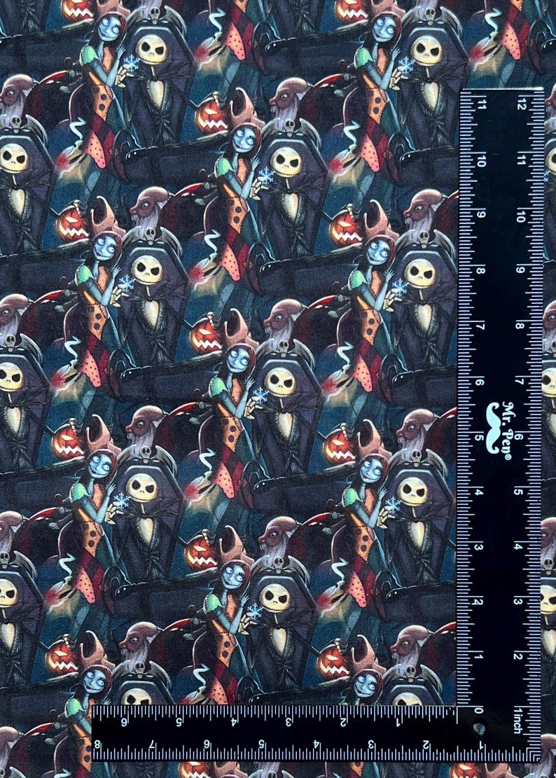 May include: A repeating pattern fabric featuring a cartoon couple, Jack Skellington and Sally from the Nightmare Before Christmas movie. The fabric is dark blue with red, green, and orange accents.