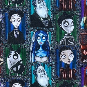 May include: A colorful fabric with a repeating pattern of characters from the movie The Nightmare Before Christmas. The characters are framed in ornate frames and are set against a green and black striped background.